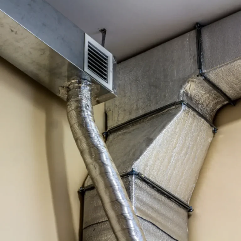 Duct and vent installation in Maui showing HVAC ventilation ductwork and wall vent for proper airflow and moisture control.